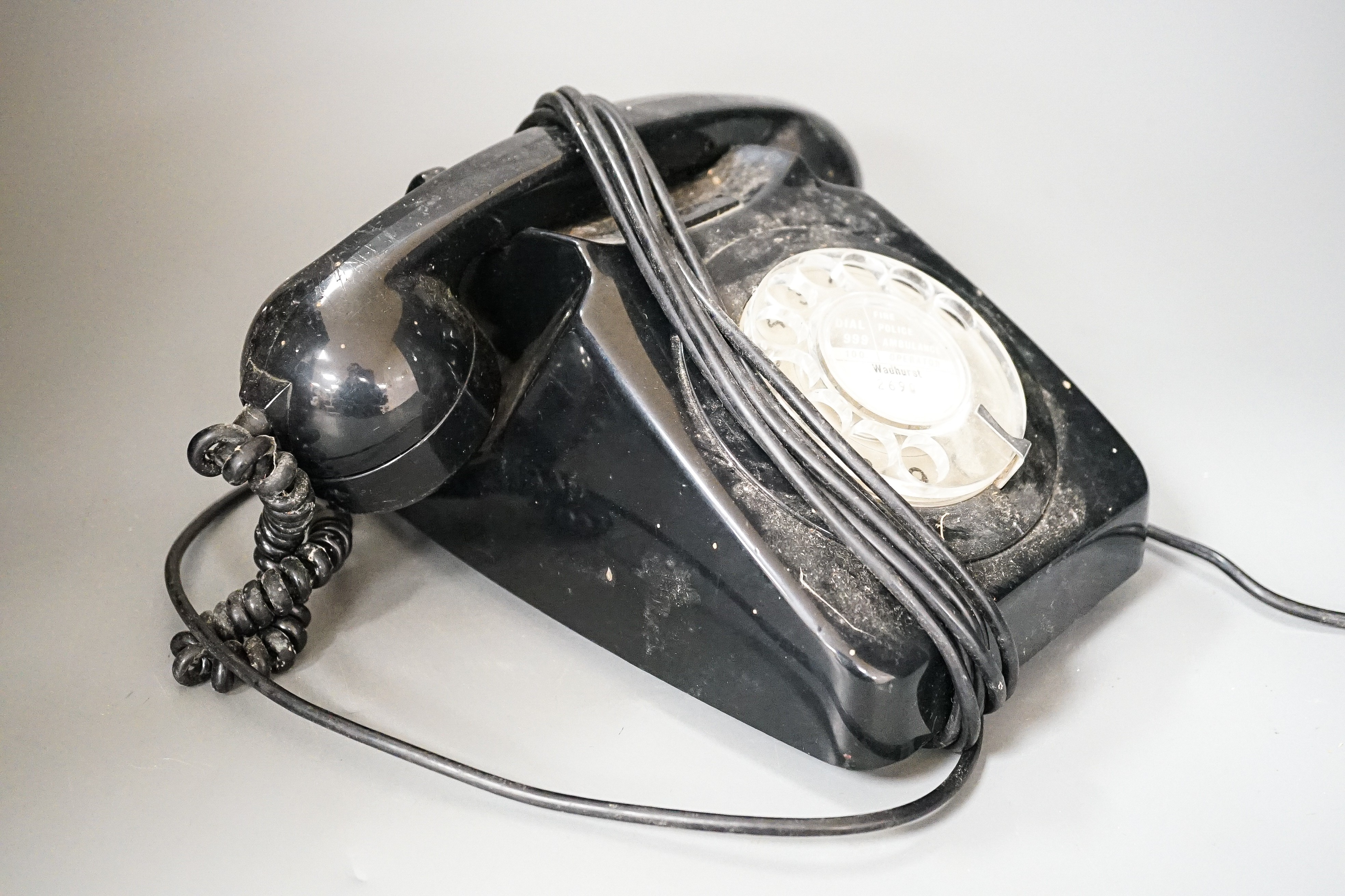A black Bakelite telephone
